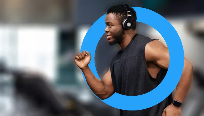 PERSON WORKING OUT WEARING HEADPHONES
